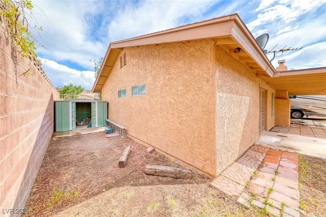 632 Arrayo Way Boulder City, NV 89005 - Photo 37 of 40 View of property exterior with stucco siding and a