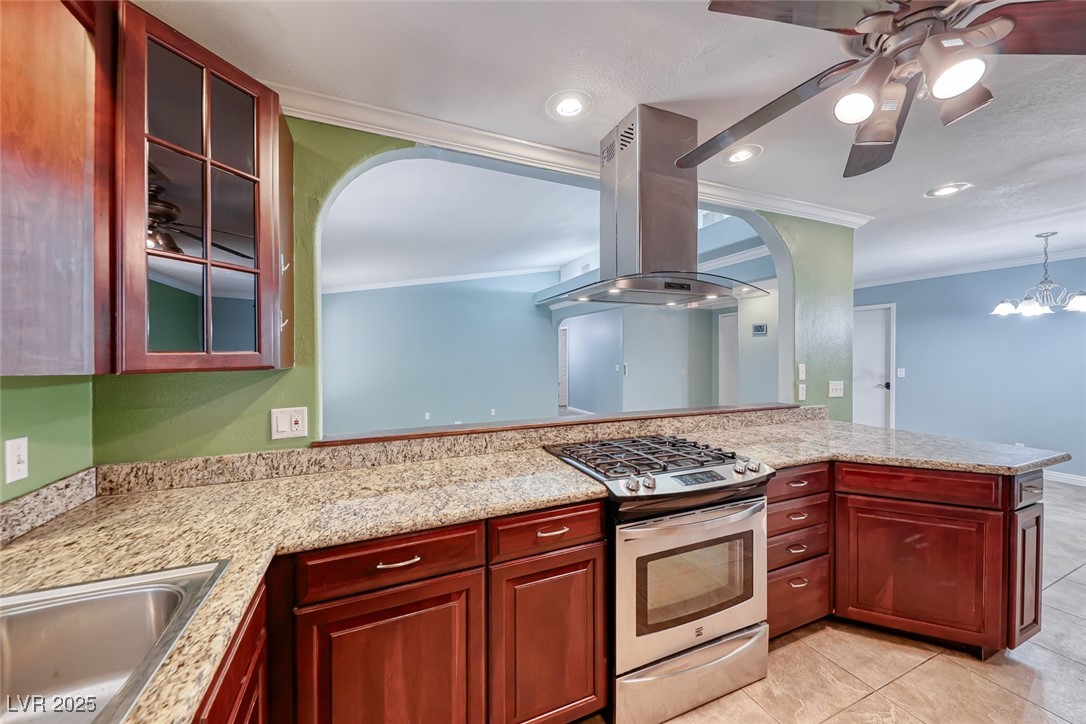632 Arrayo Way Boulder City, NV 89005 - Photo 7 of 40 Kitchen with stainless steel gas stove, island exh