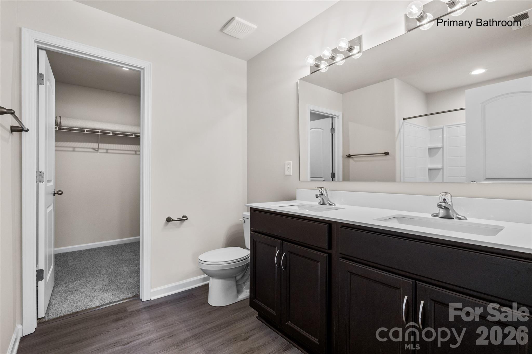 2315 State Rd S-29-395 Lancaster, SC 29720 - Photo 10 of 21 a bathroom with a double vanity sink toilet and mirror