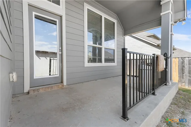a view of a porch of a house