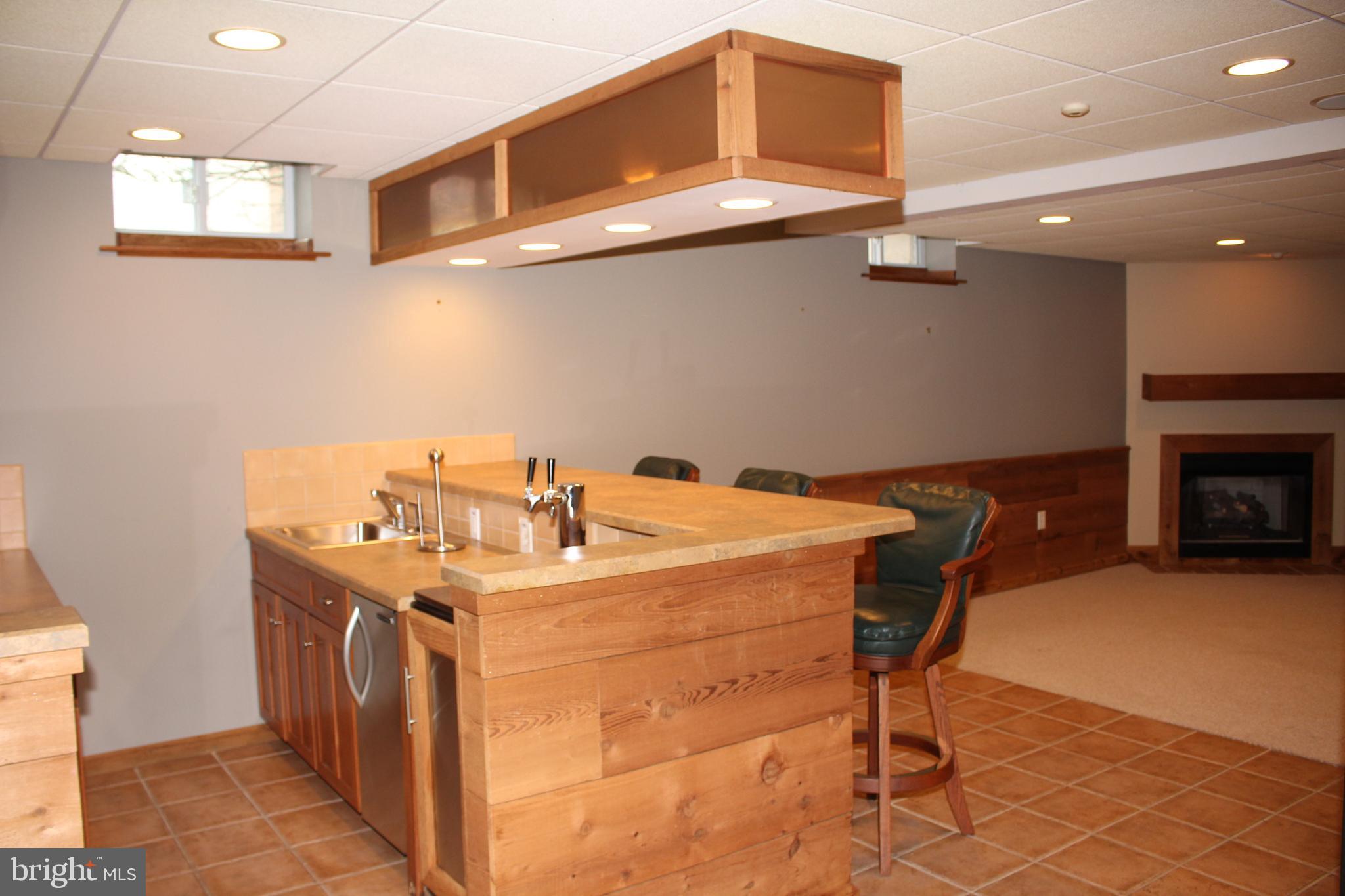 176 South Patricia Drive Swedesboro, NJ 08085 - Photo 3 of 61 a hallway with a sink a washer and dryer