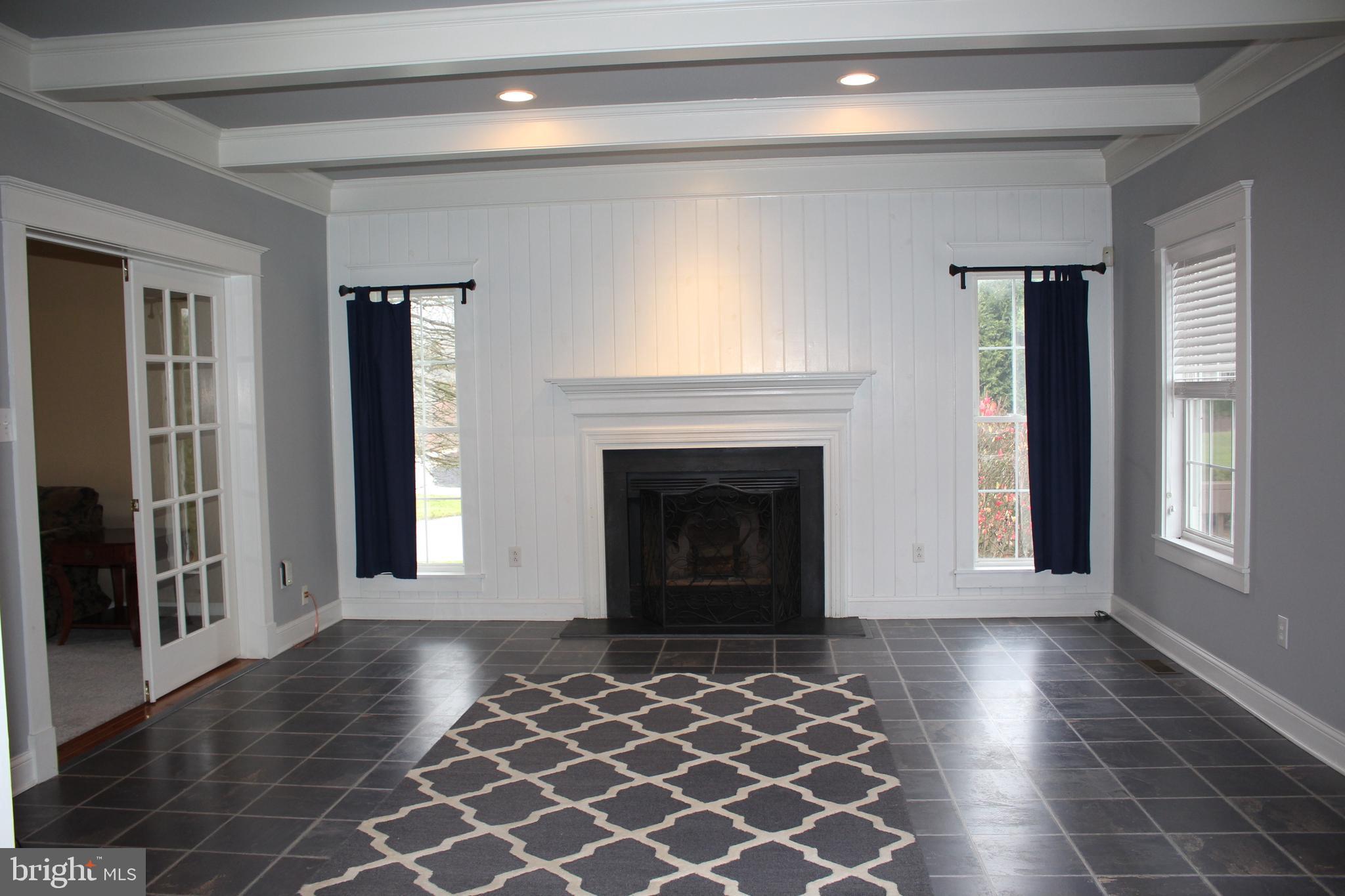176 South Patricia Drive Swedesboro, NJ 08085 - Photo 35 of 61 a view of a livingroom with a fireplace and window