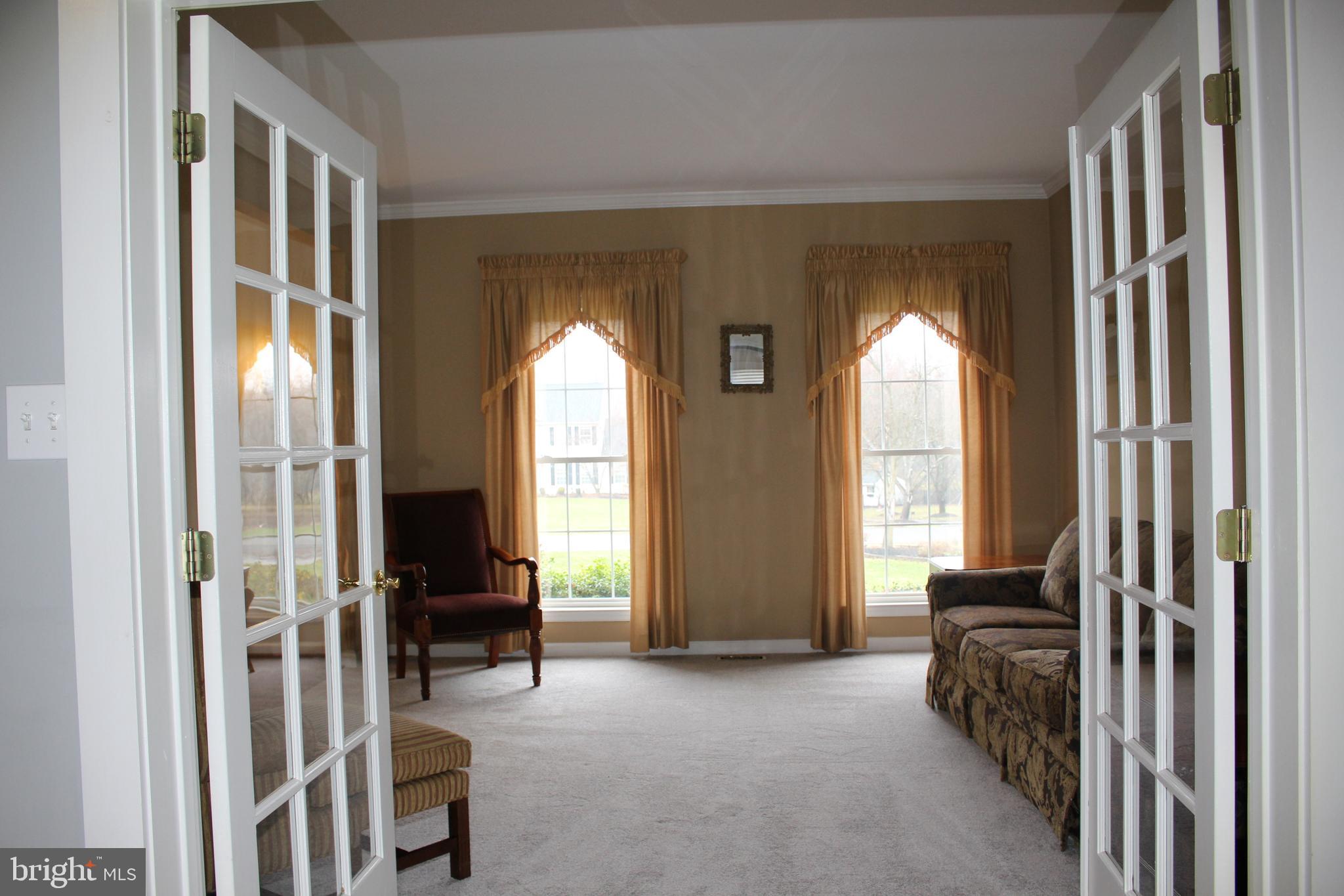 176 South Patricia Drive Swedesboro, NJ 08085 - Photo 39 of 61 a view of a livingroom with a furniture and floor to ceiling window