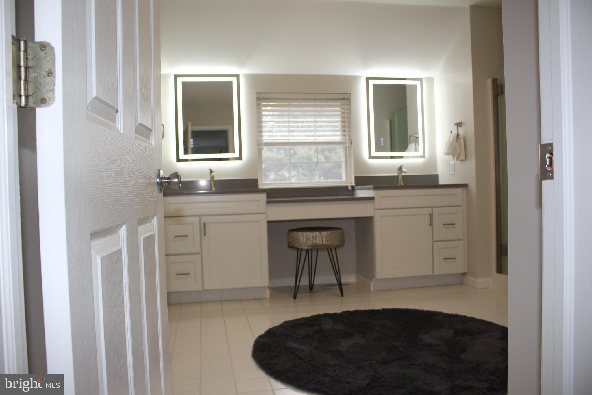 176 South Patricia Drive Swedesboro, NJ 08085 - Photo 44 of 61 a kitchen with granite countertop a sink a stove and cabinets
