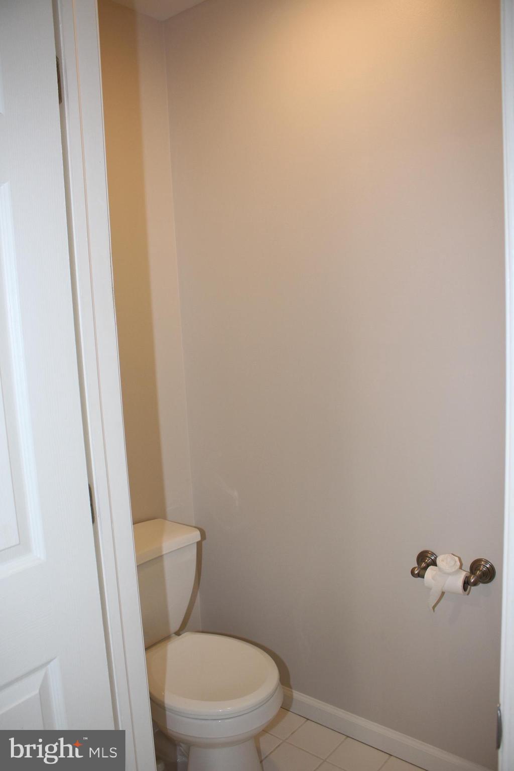 176 South Patricia Drive Swedesboro, NJ 08085 - Photo 47 of 61 a white toilet sitting next to a shower