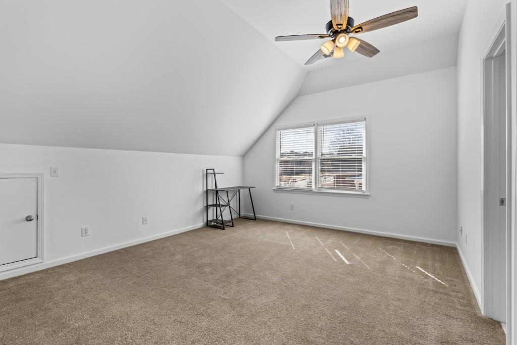 466 Middleton Place Grayson, GA 30017 - Photo 45 of 106 an empty room with windows and fan