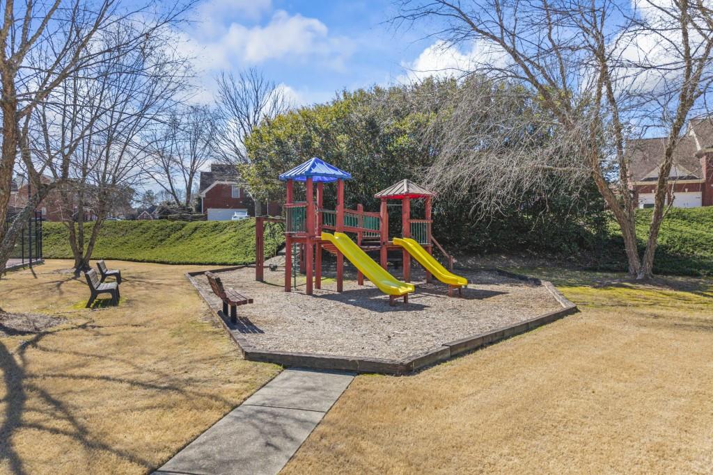 466 Middleton Place Grayson, GA 30017 - Photo 92 of 106 a view of a park with slide