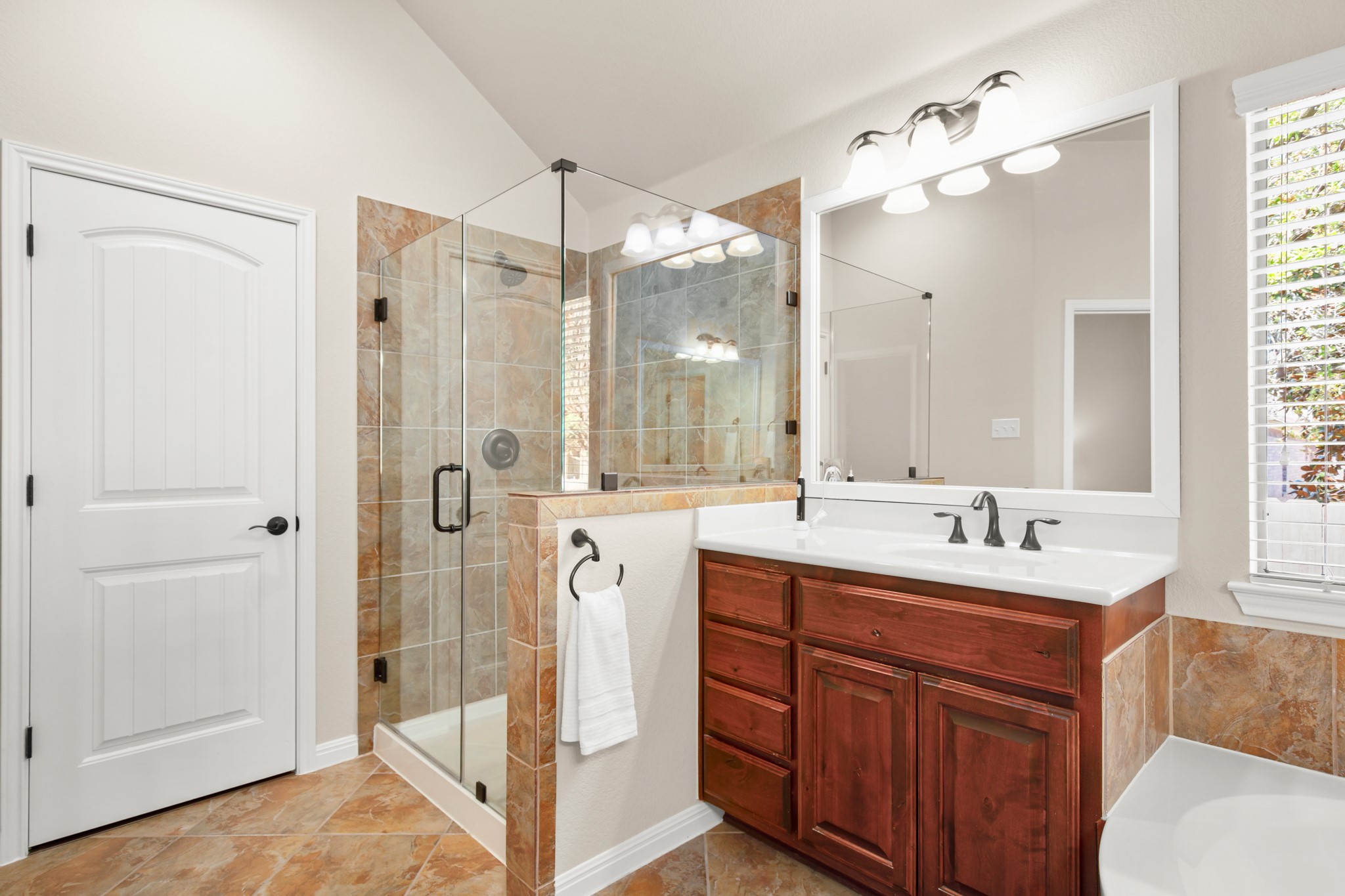 1906 Tall Chief Leander, TX 78641 - Photo 23 of 38 a bathroom with a double vanity sink mirror and double
