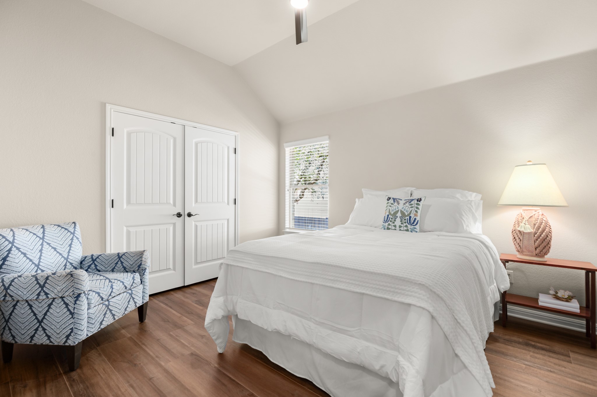 1906 Tall Chief Leander, TX 78641 - Photo 24 of 38 a spacious bedroom with a bed and a couch