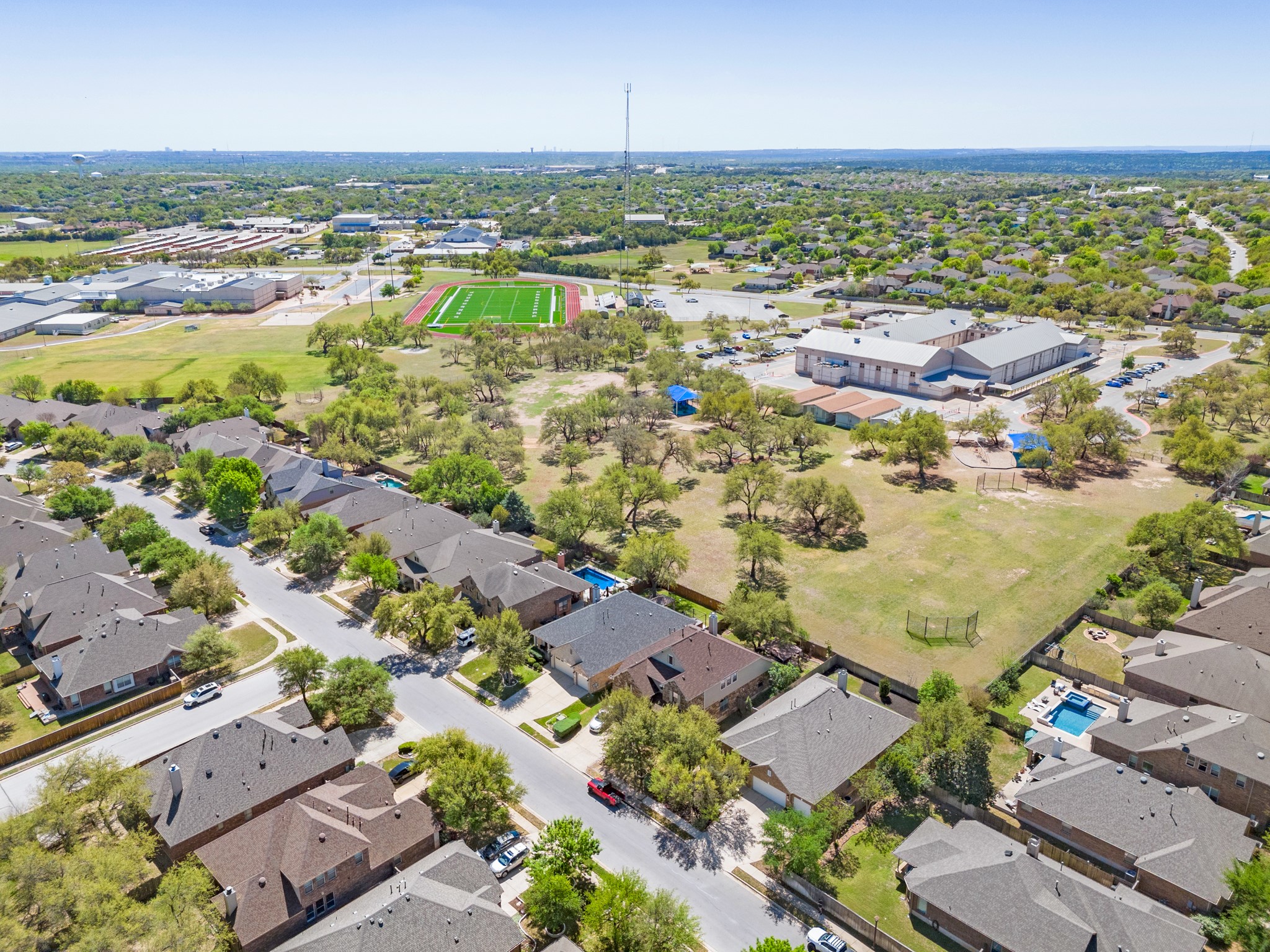 1906 Tall Chief Leander, TX 78641 - Photo 31 of 38 an aerial view of residential houses with outdoor space