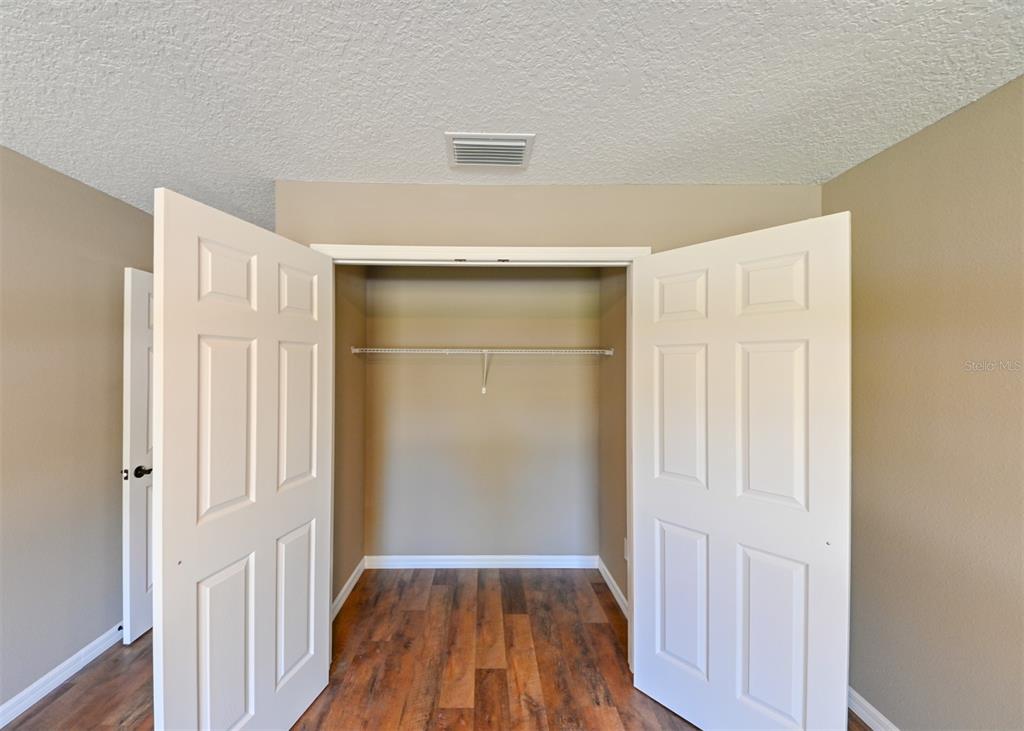 5430 West Tortuga Loop Lecanto, FL 34461 - Photo 19 of 51 a view of a room with wooden floor and entryway