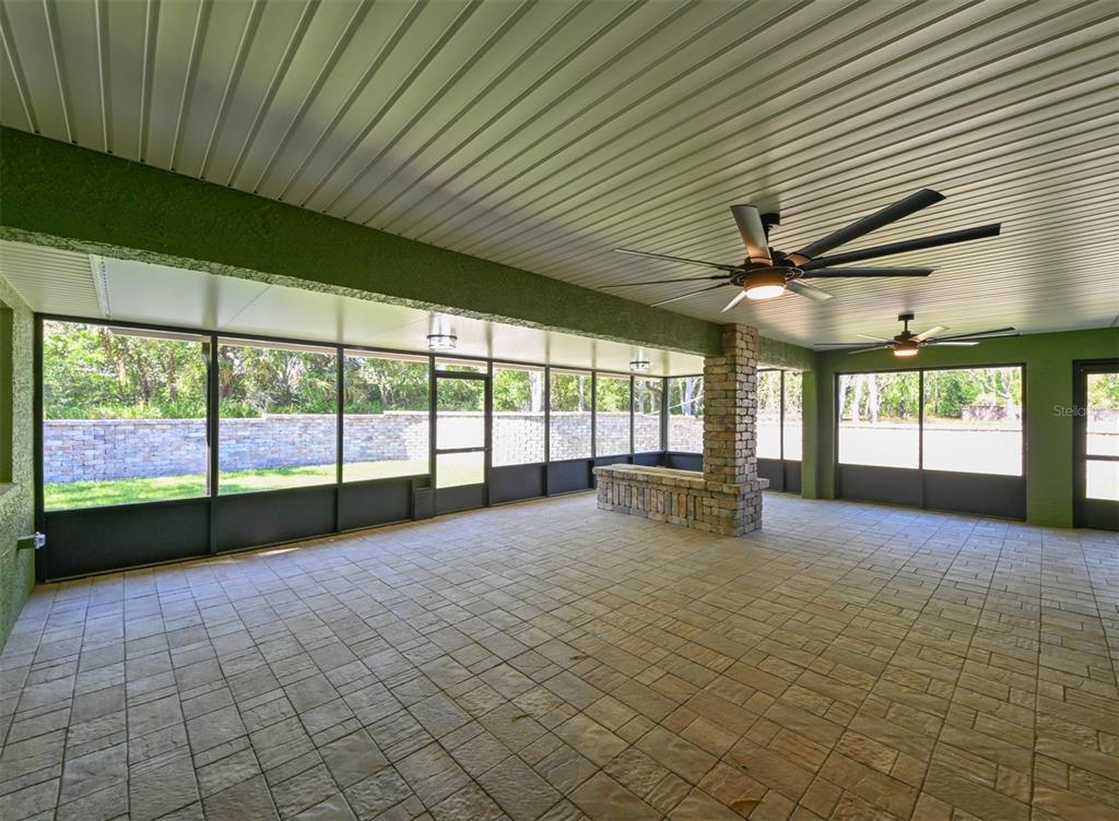 5430 West Tortuga Loop Lecanto, FL 34461 - Photo 3 of 51 a view of big room with wooden floor and windows