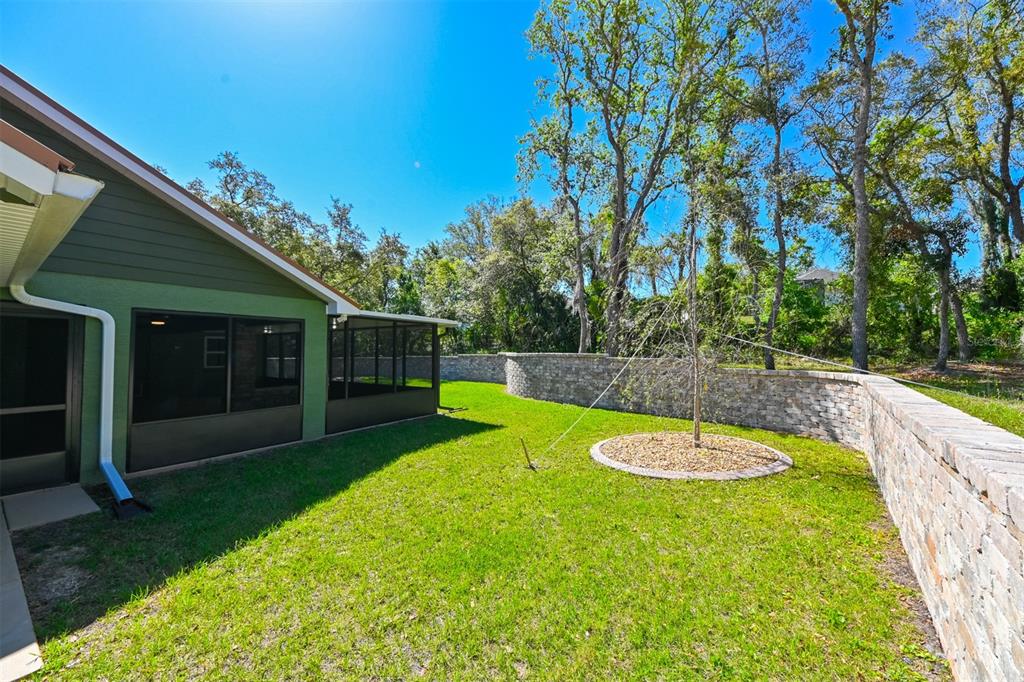 5430 West Tortuga Loop Lecanto, FL 34461 - Photo 33 of 51 a view of a backyard with a small cabin