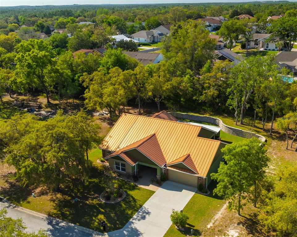 5430 West Tortuga Loop Lecanto, FL 34461 - Photo 46 of 51 an aerial view of house with yard swimming pool and outdoor seating
