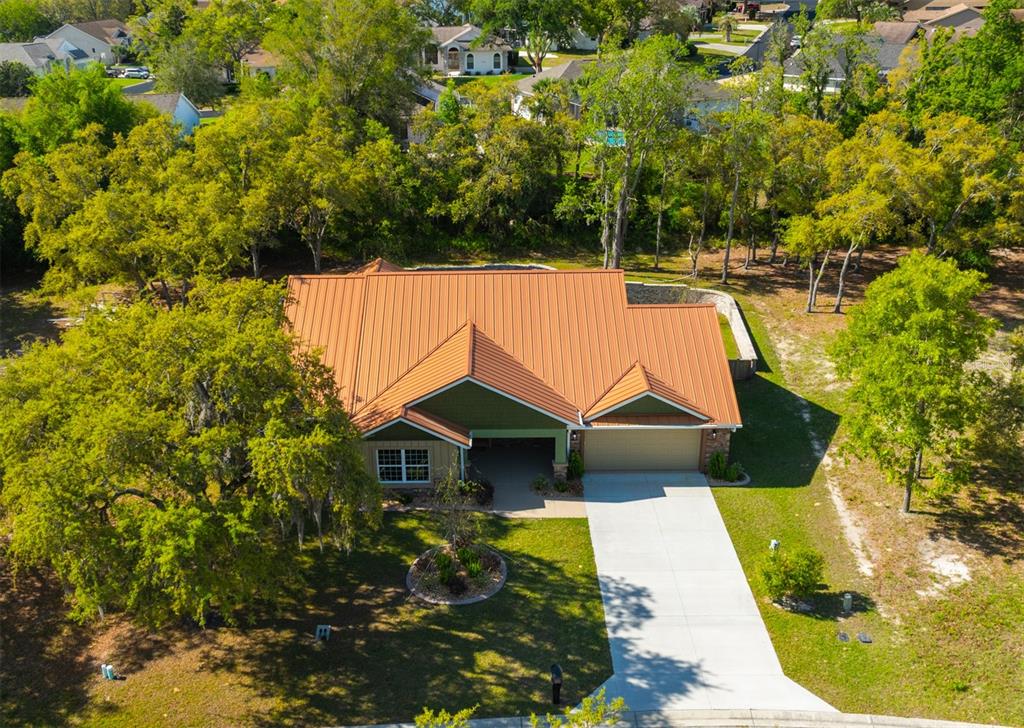5430 West Tortuga Loop Lecanto, FL 34461 - Photo 48 of 51 an aerial view of house with yard