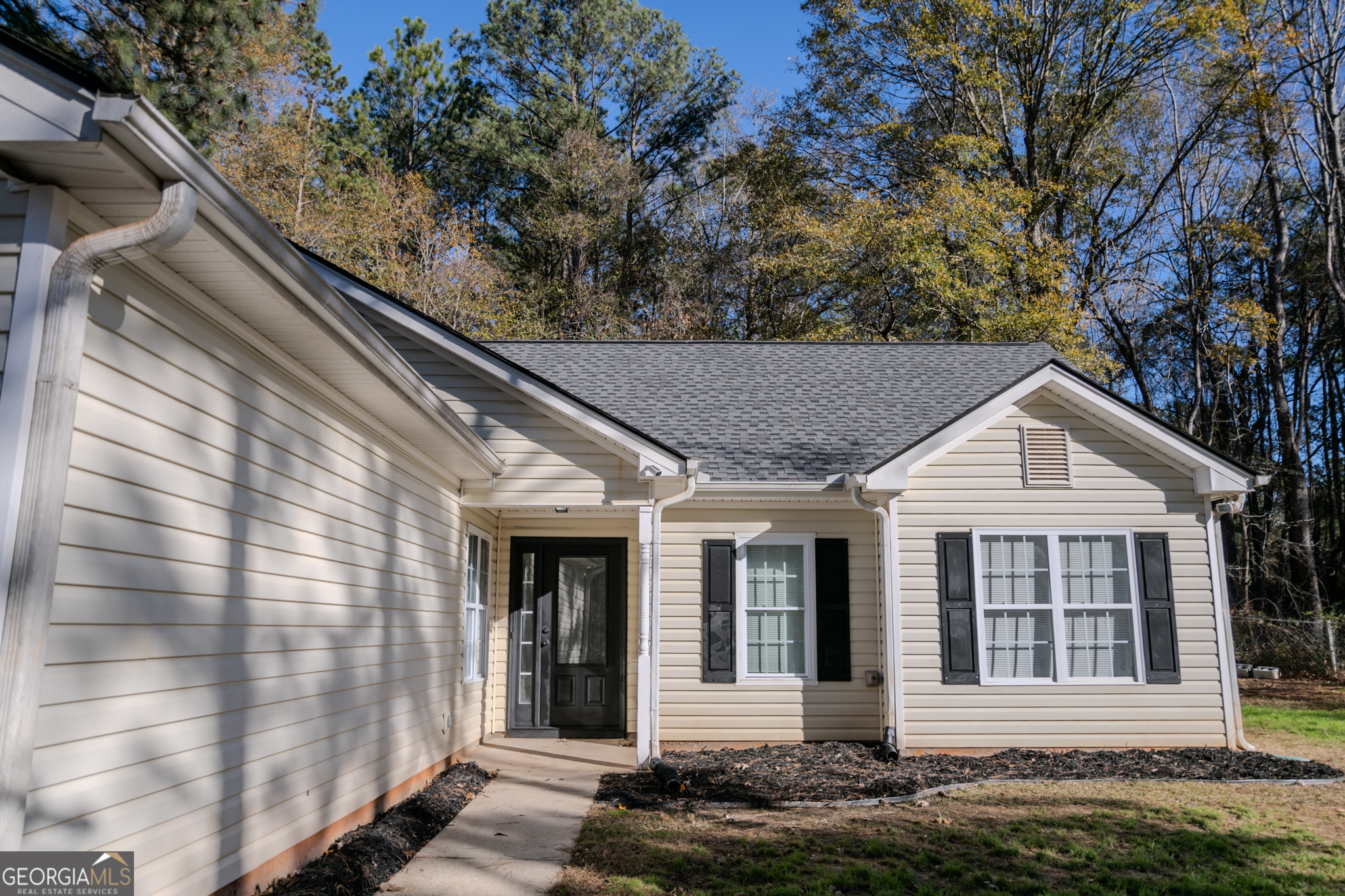 55 Corn Row Court Newnan, GA 30263 - Photo 1 of 72 a front view of a house with a garden