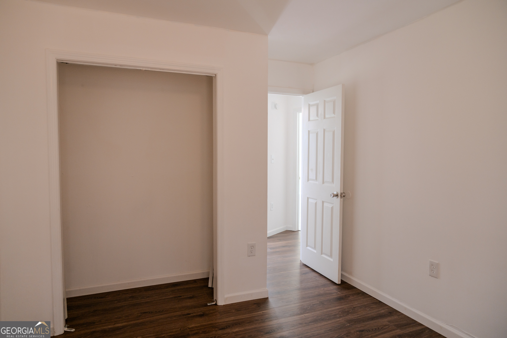 55 Corn Row Court Newnan, GA 30263 - Photo 32 of 72 a view of empty room with wooden floor