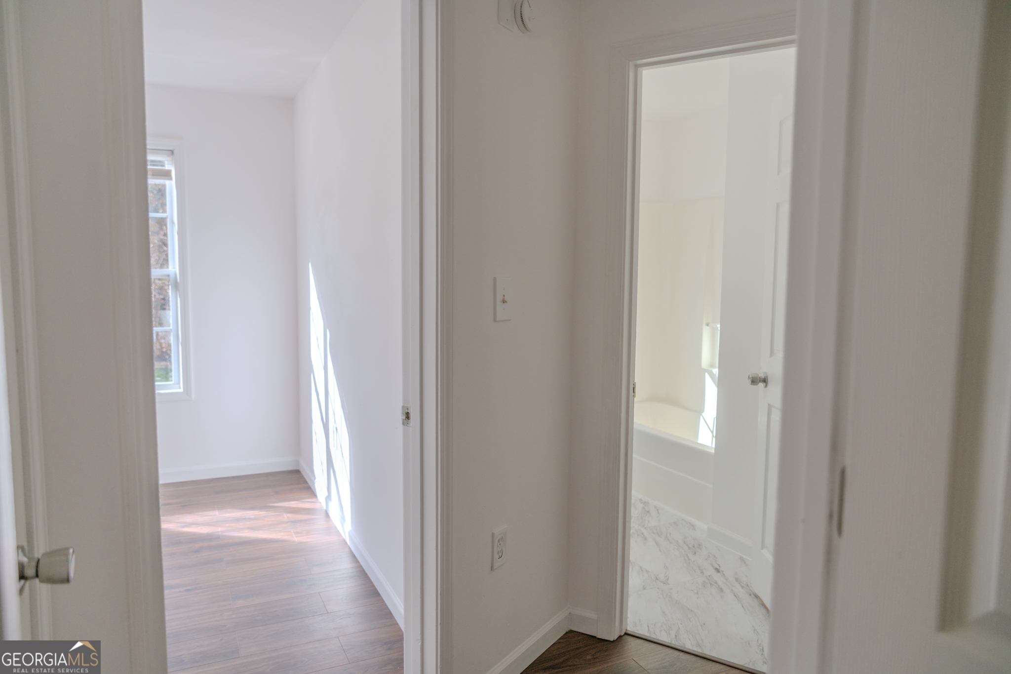 55 Corn Row Court Newnan, GA 30263 - Photo 33 of 72 a view of a bathroom from the hallway