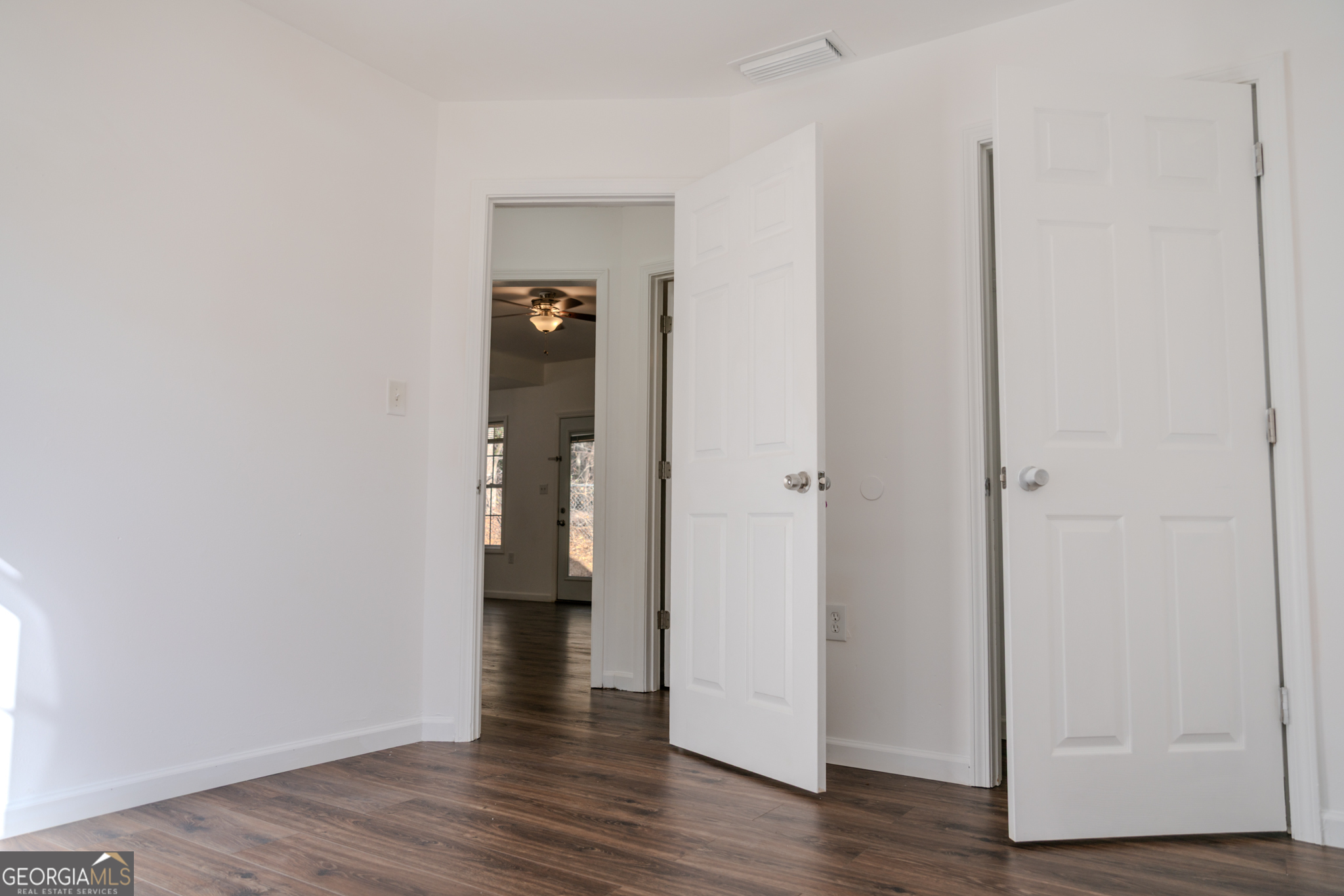 55 Corn Row Court Newnan, GA 30263 - Photo 34 of 72 a view of a hallway with wooden floor