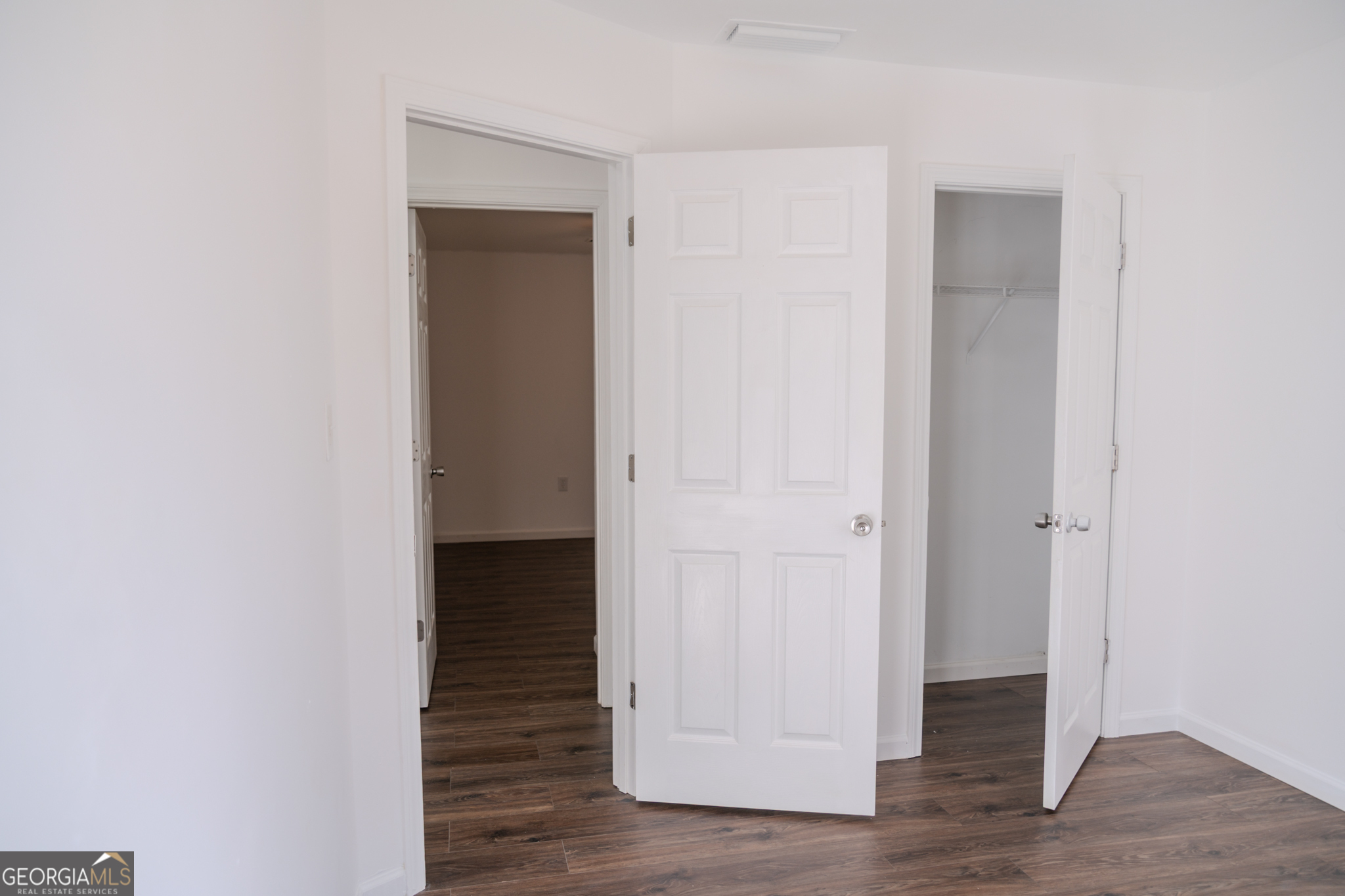 55 Corn Row Court Newnan, GA 30263 - Photo 35 of 72 a view of a hallway with wooden floor