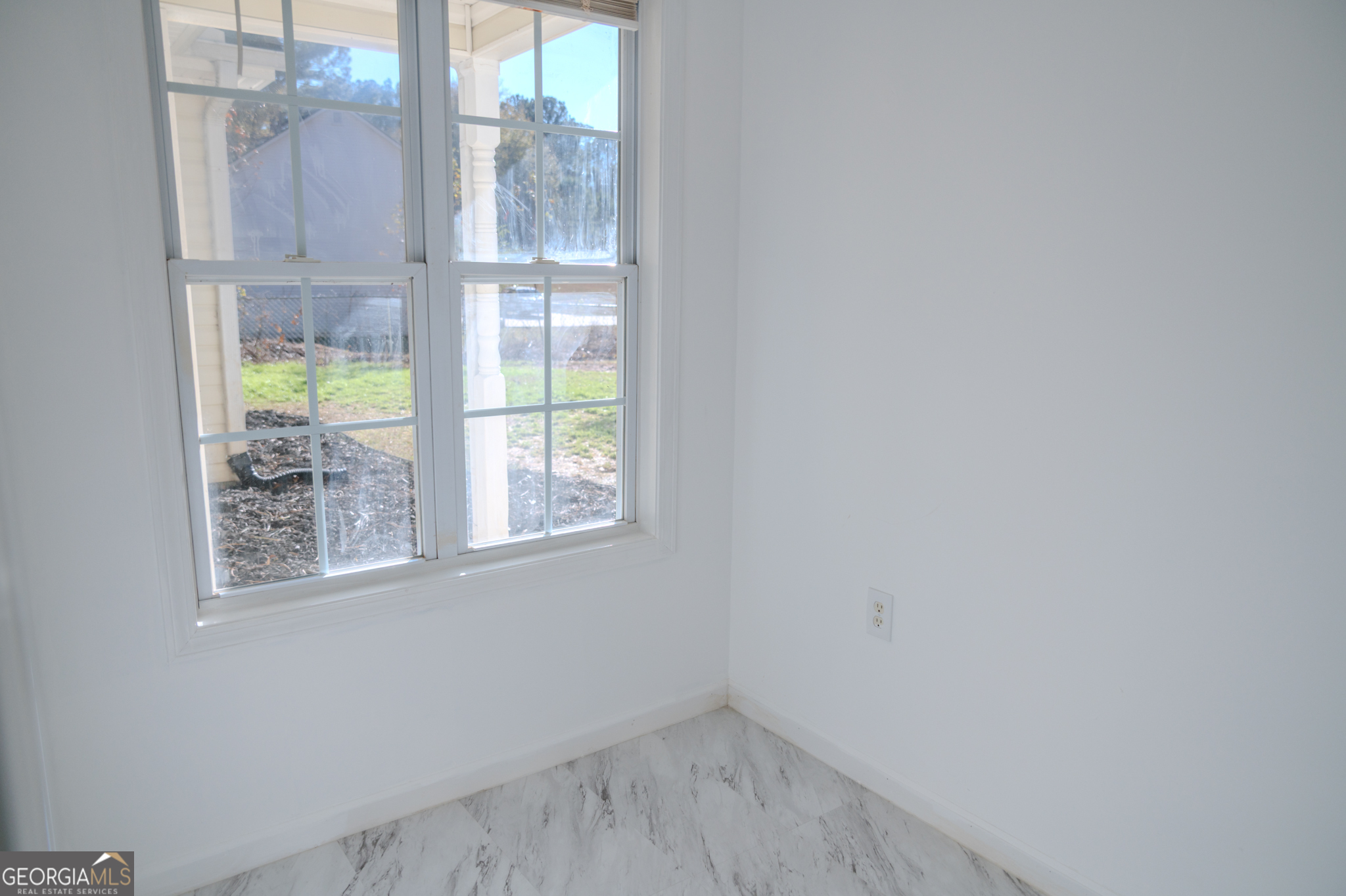 55 Corn Row Court Newnan, GA 30263 - Photo 47 of 72 a view of empty room with windows