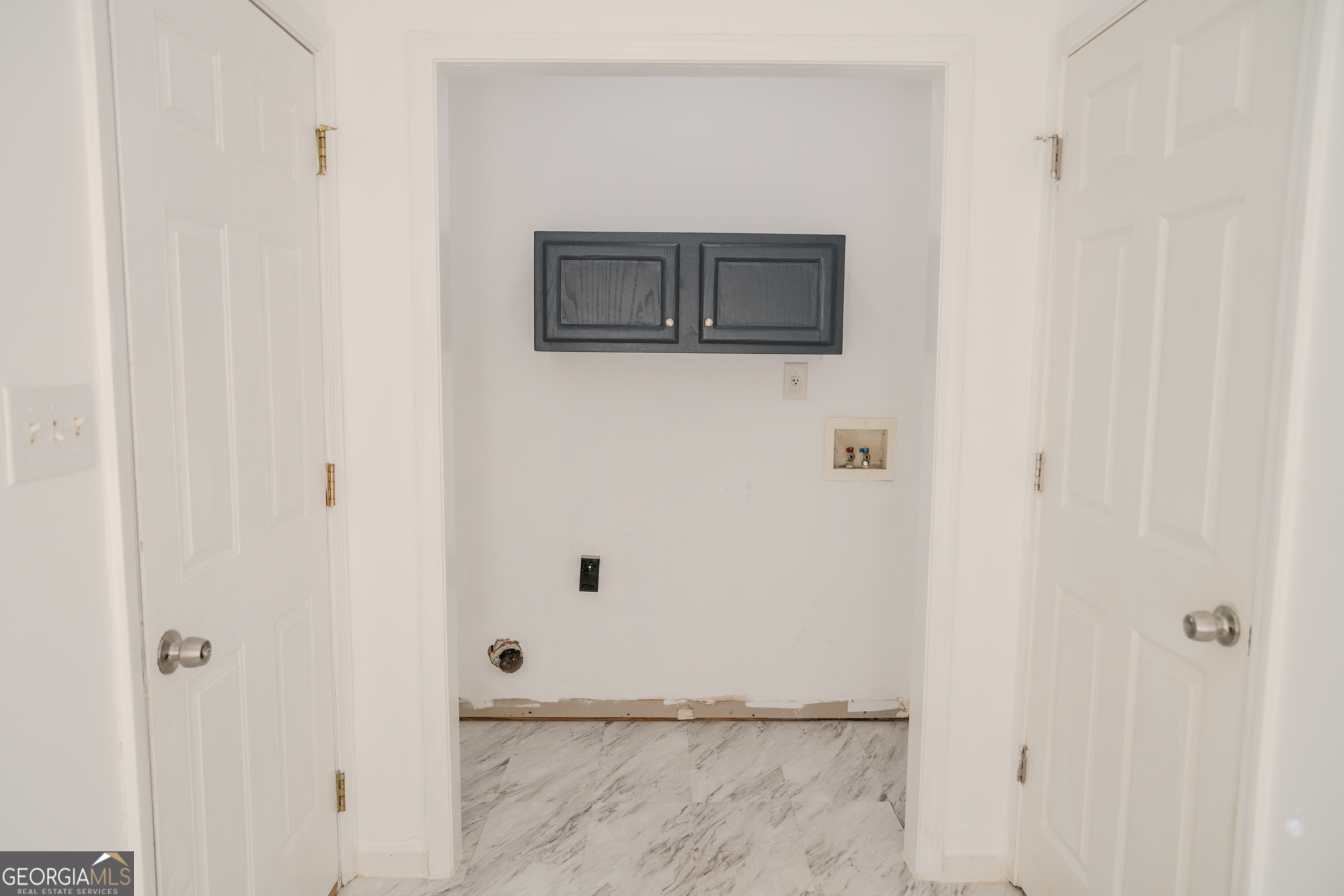 55 Corn Row Court Newnan, GA 30263 - Photo 48 of 72 a bathroom with a sink and a mirror
