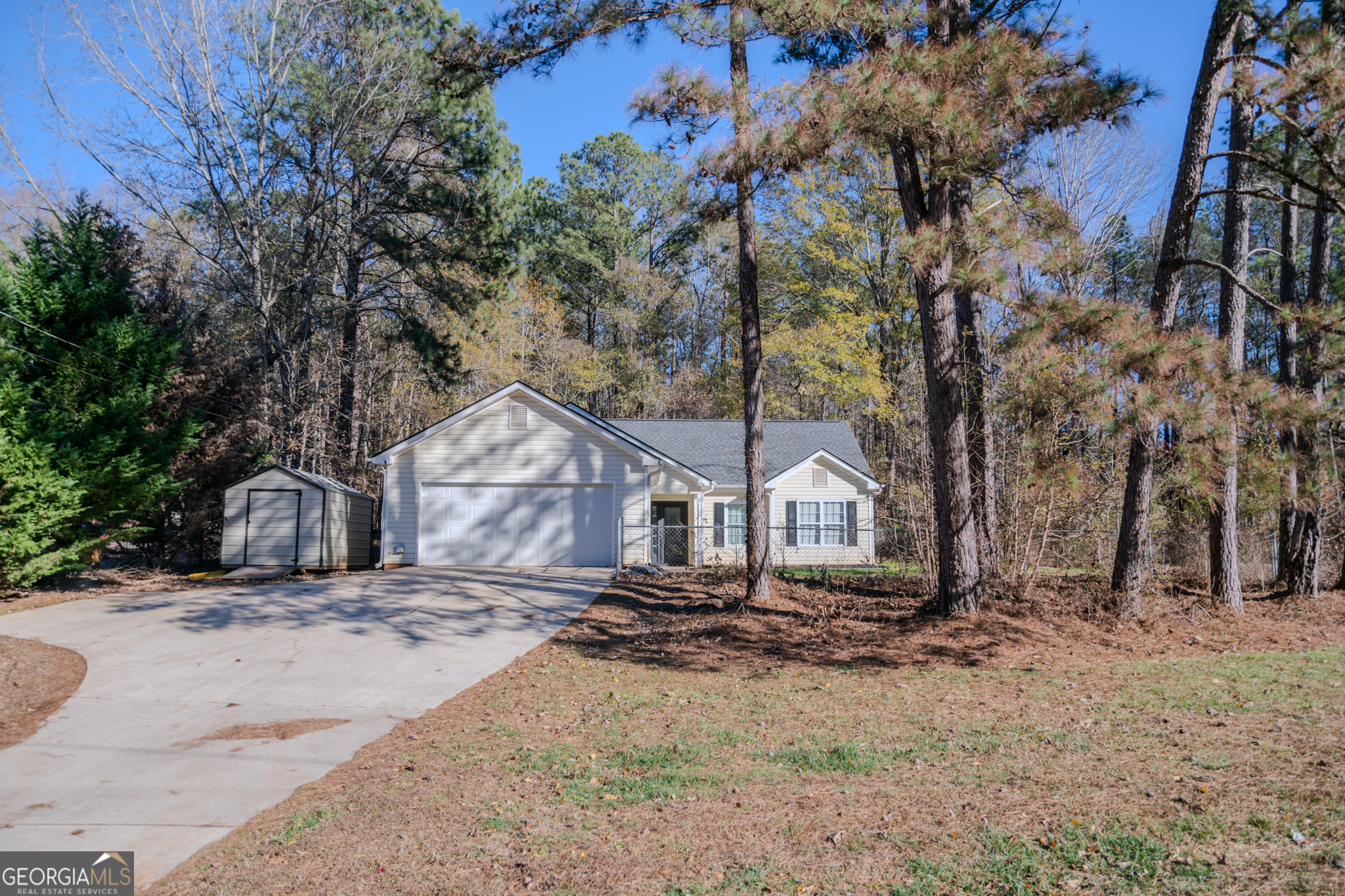 55 Corn Row Court Newnan, GA 30263 - Photo 5 of 72 a front view of a house with a yard and large tree