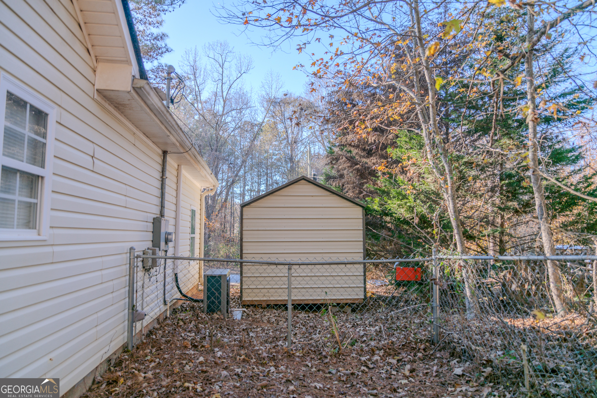 55 Corn Row Court Newnan, GA 30263 - Photo 61 of 72 a backyard of a house with lots of green space