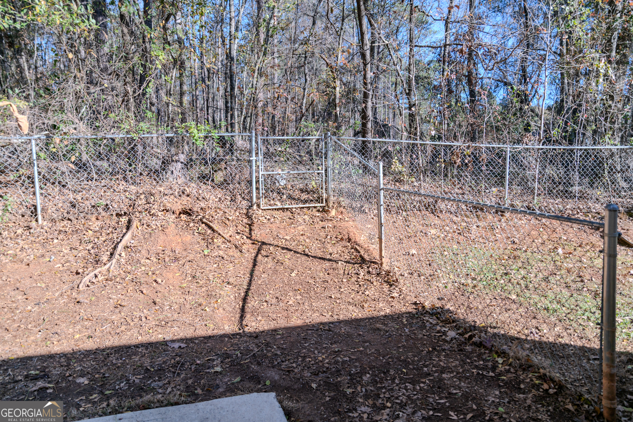 55 Corn Row Court Newnan, GA 30263 - Photo 66 of 72 a view of a yard with wooden fence