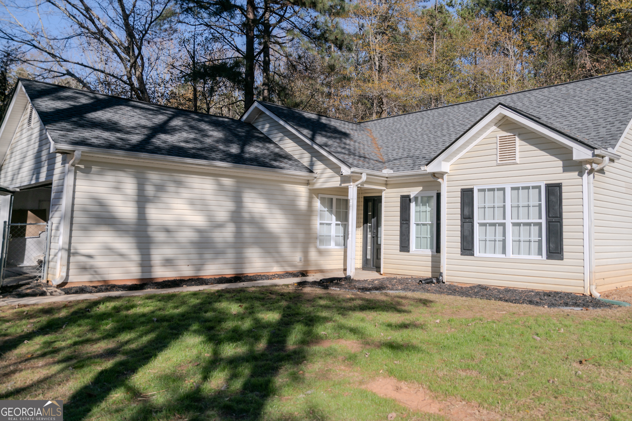 55 Corn Row Court Newnan, GA 30263 - Photo 9 of 72 a front view of a house with a yard