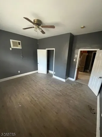 a view of a livingroom with a ceiling fan