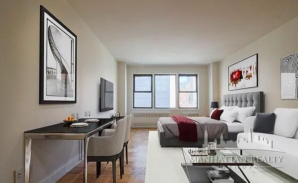 a living room with furniture large window and flat screen tv