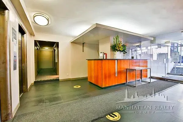 a view of a living room and bathroom
