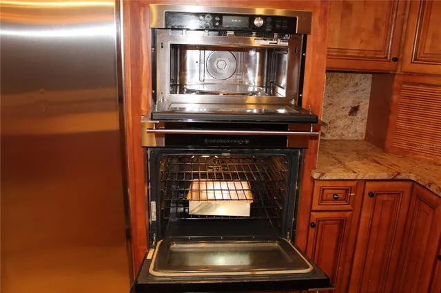 a room with a window and wooden floor