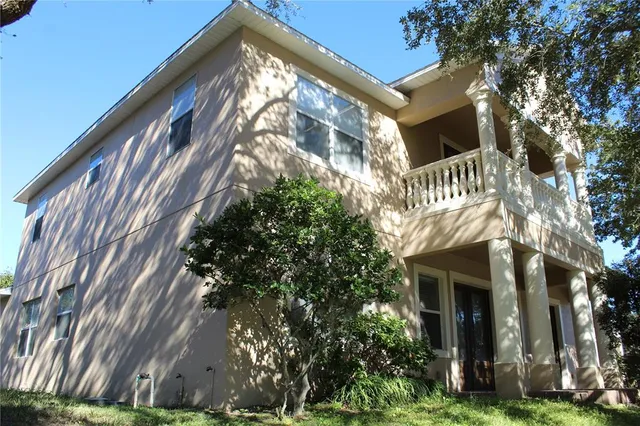 a view of a door with wooden fence