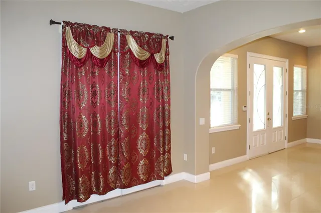 an empty room with window