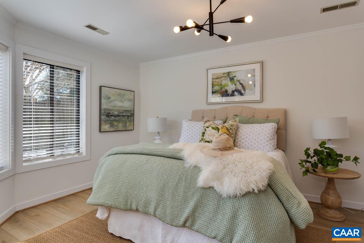 1243 Chatham Ridge Charlottesville, VA 22901 - Photo 11 of 23 a bedroom with a bed and a window