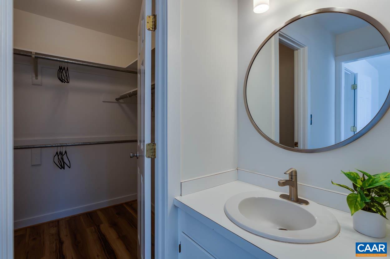 1243 Chatham Ridge Charlottesville, VA 22901 - Photo 17 of 23 a bathroom with a sink and a mirror