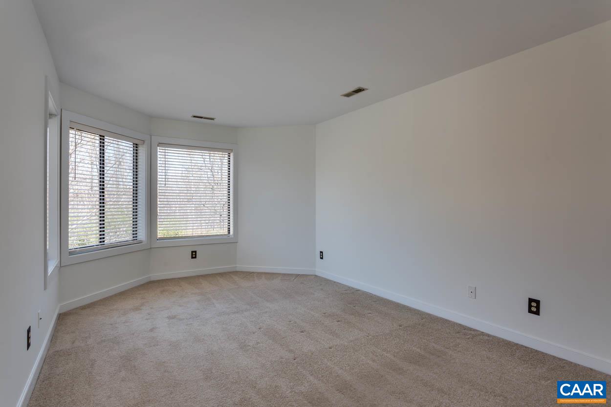 1243 Chatham Ridge Charlottesville, VA 22901 - Photo 20 of 23 an empty room with windows