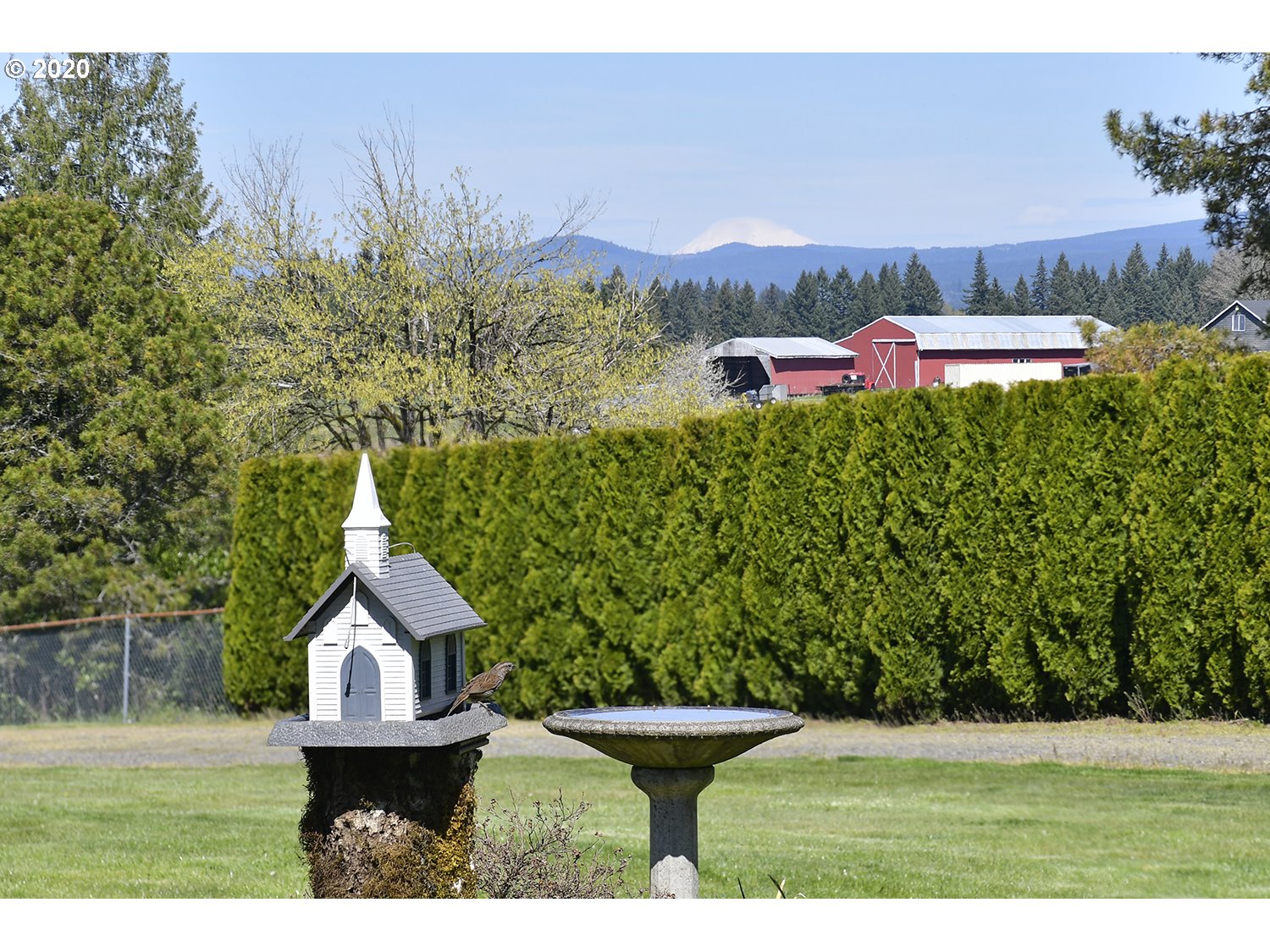 35421 Southeast Gunderson Road Sandy, OR 97055 - Photo 21 of 32 a view of a house with a yard and sitting area