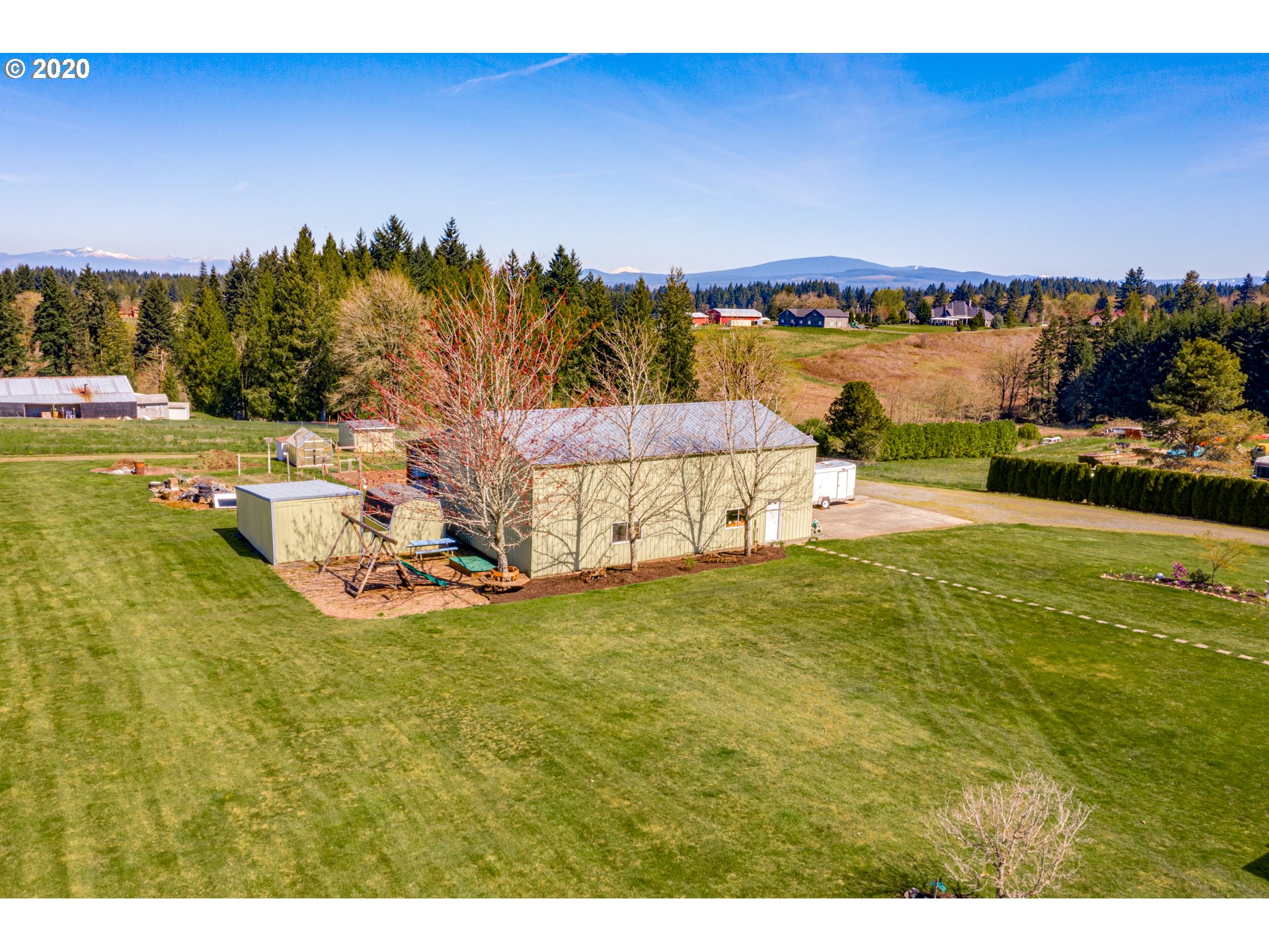 35421 Southeast Gunderson Road Sandy, OR 97055 - Photo 27 of 32 a view of a house with a yard and lake view