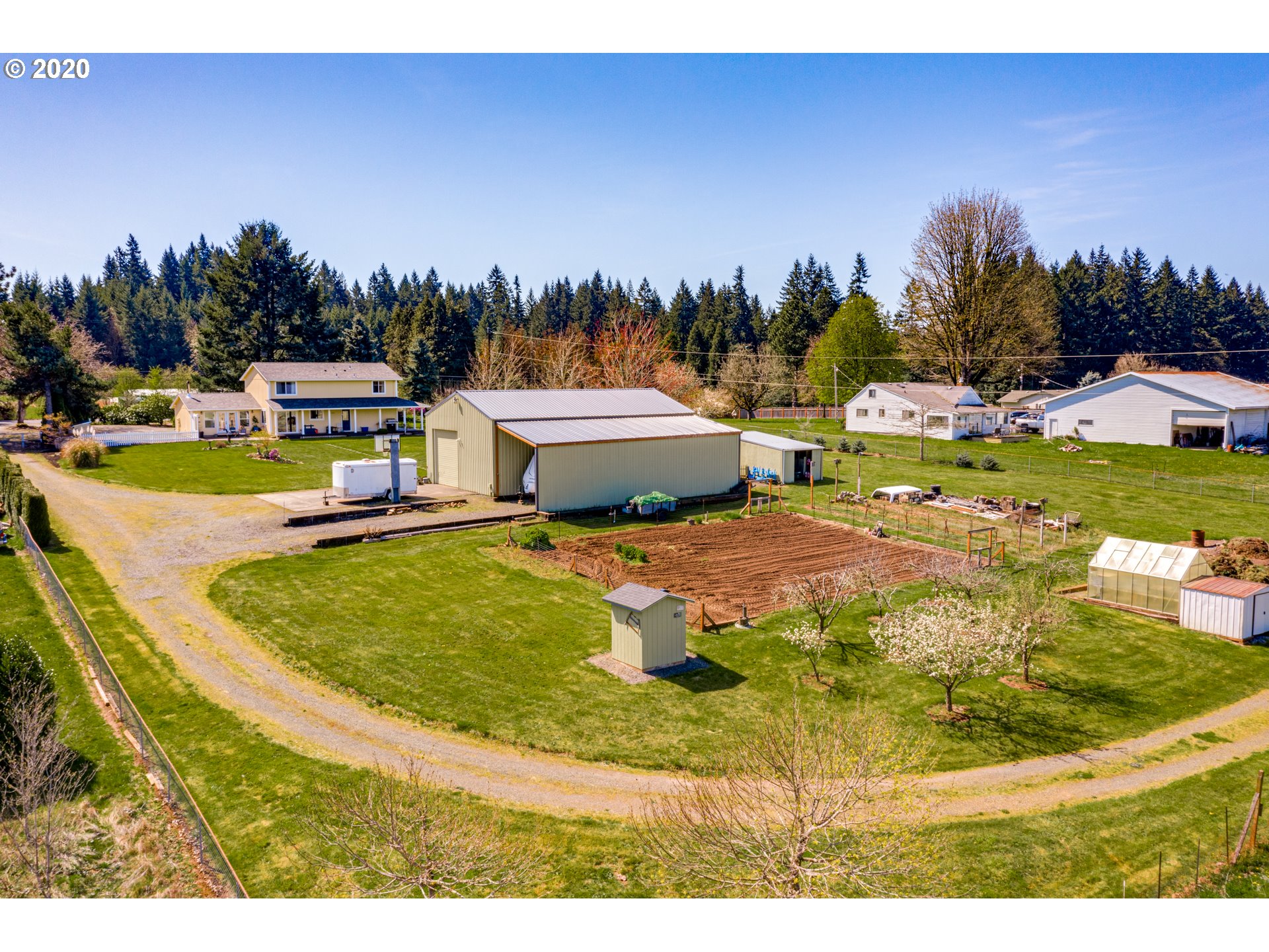 35421 Southeast Gunderson Road Sandy, OR 97055 - Photo 28 of 32 a swimming pool with trees in the background