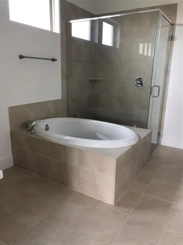 a bath tub sitting in a bathroom
