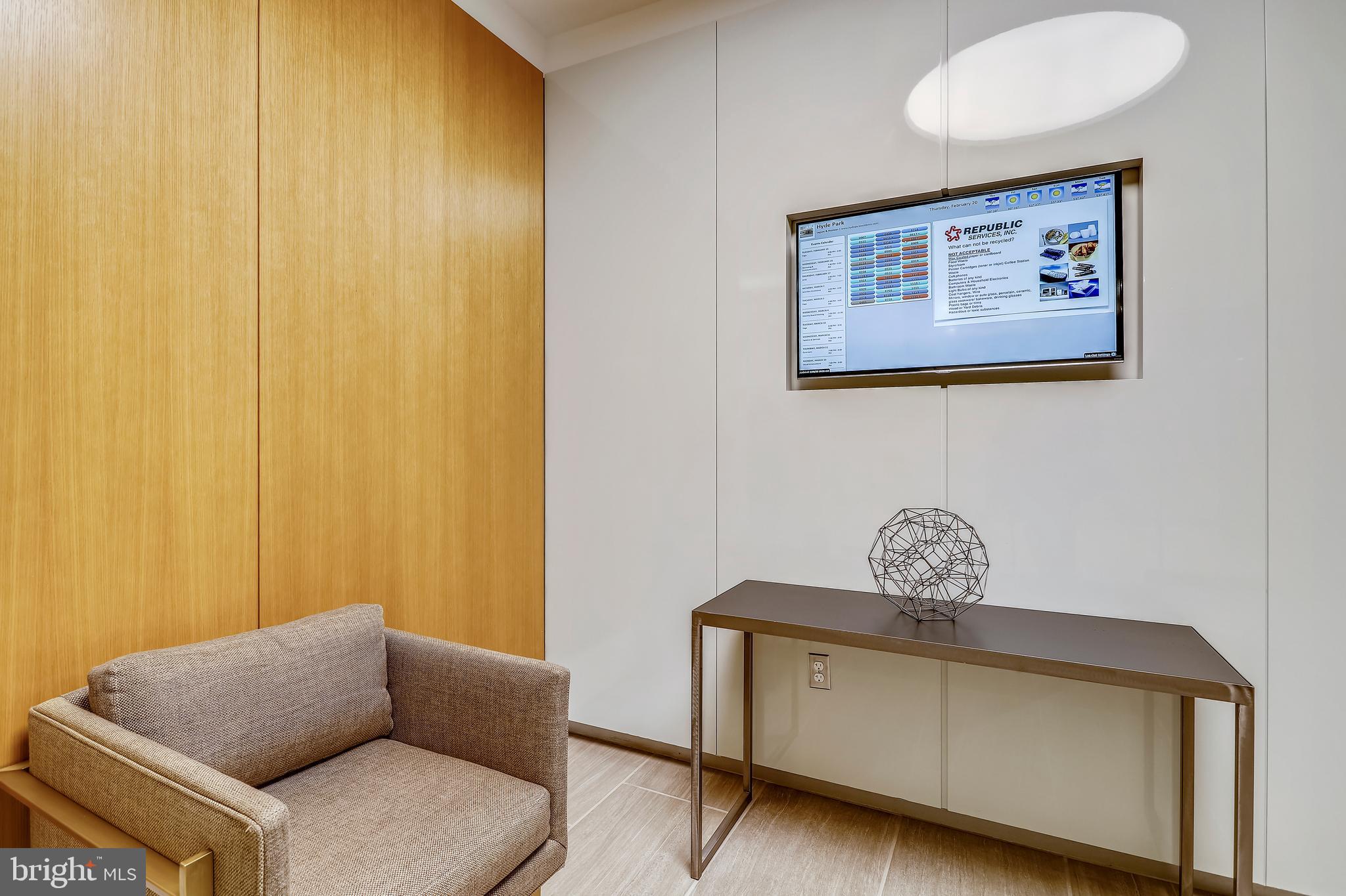 4141 North Henderson Road, Unit 322 Arlington, VA 22203 - Photo 37 of 53 Reader board notifies residents of deliveries.