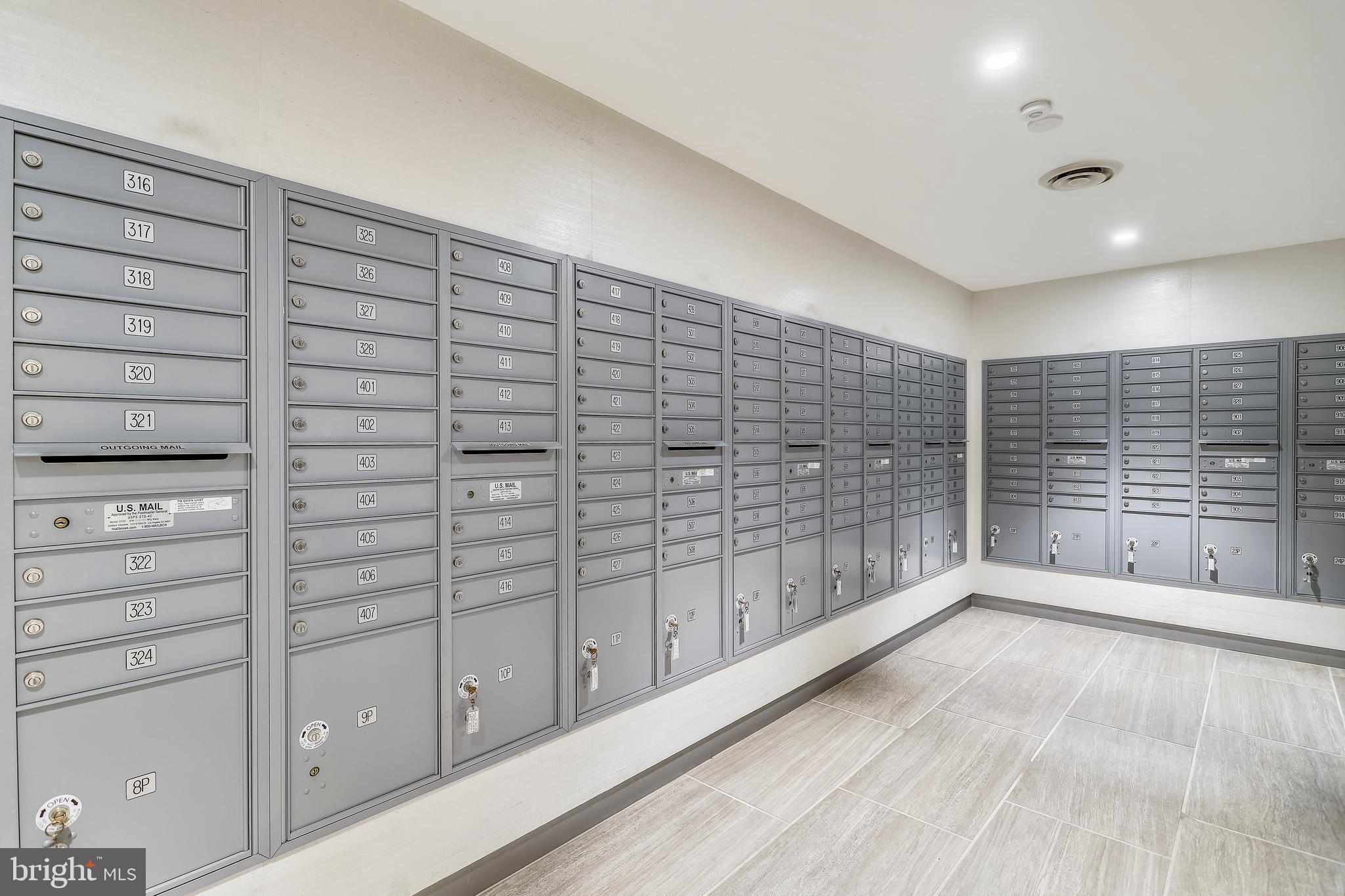 4141 North Henderson Road, Unit 322 Arlington, VA 22203 - Photo 38 of 53 Updated mailroom with small package lockers.
