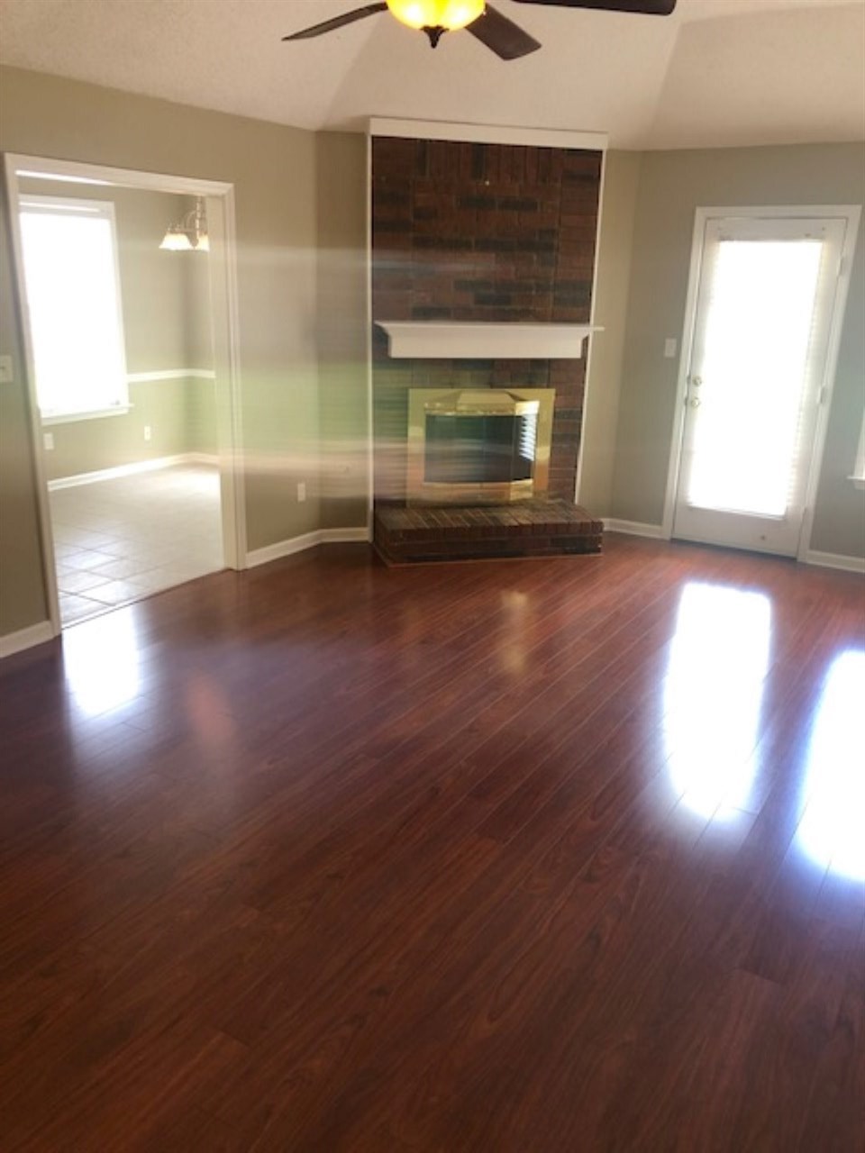 1386 Milestone Circle Collierville, TN 38017 - Photo 6 of 16 a view of empty room with wooden floor and fan