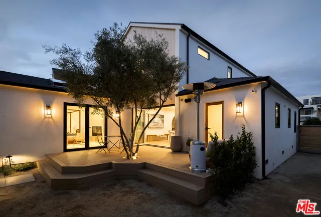 a house view with a outdoor space