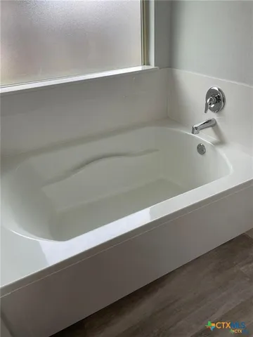 a close up of a bathtub