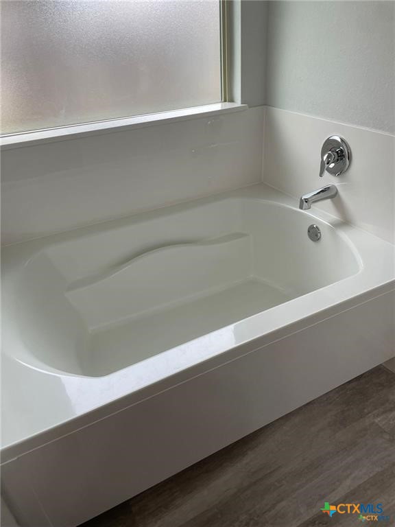 2411 Pintail Loop Copperas Cove, TX 76522 - Photo 12 of 13 a close up of a bathtub