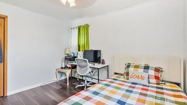 a work room with a table and chairs